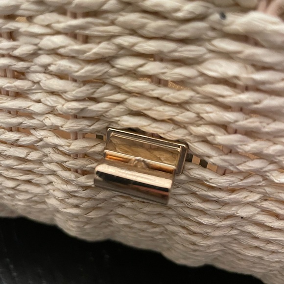 Ann Taylor straw woven clutch with gold accents. Fold over toggle closure. - Picture 4 of 12